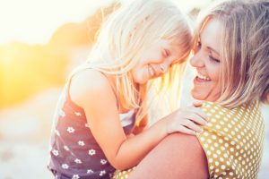 Image of a mother and daughter enjoying life